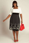 Plus size dress with white top and below knee black skirt